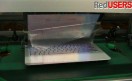 Mientras por arriba circulan las notebook en el proceso de armado, por debajo lo hacen, en el sentido contrario, las que ya están terminadas haciendo un testeo