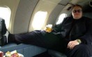 Kim DotCom, viajando plácidamente desde Nueva Zelanda a Hong Kong.