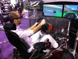 En el stand de NVIDIA en la CES, probando todo el poder de procesamiento en un juego 3D de formula 1. Fue uno de los tantos "sacrificios" que hicimos para brindarles la mejor cobertura de la feria- En el stand de NVIDIA en la CES, probando todo el poder de procesamiento en un juego 3D de formula 1. Fue uno de los tantos "sacrificios" que hicimos para brindarles la mejor cobertura de la feria-
