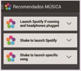 Seleccionamos una de las categorías y, luego, una de las acciones recomendadas. Para este ejemplo elegimos [Música]. Dentro de las acciones encontramos una que nos permite lanzar una canción específica cuando agitamos el teléfono. Las opciones pueden complejizarse más. Por ejemplo, arriba vemos una que dice "Lanzar Spotify si se está corriendo y los auriculares están enchufados". Para continuar presionamos sobre [GET IT!].